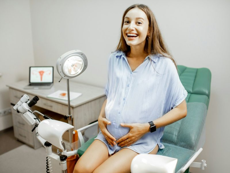 Pregnant woman on the gynecological chair